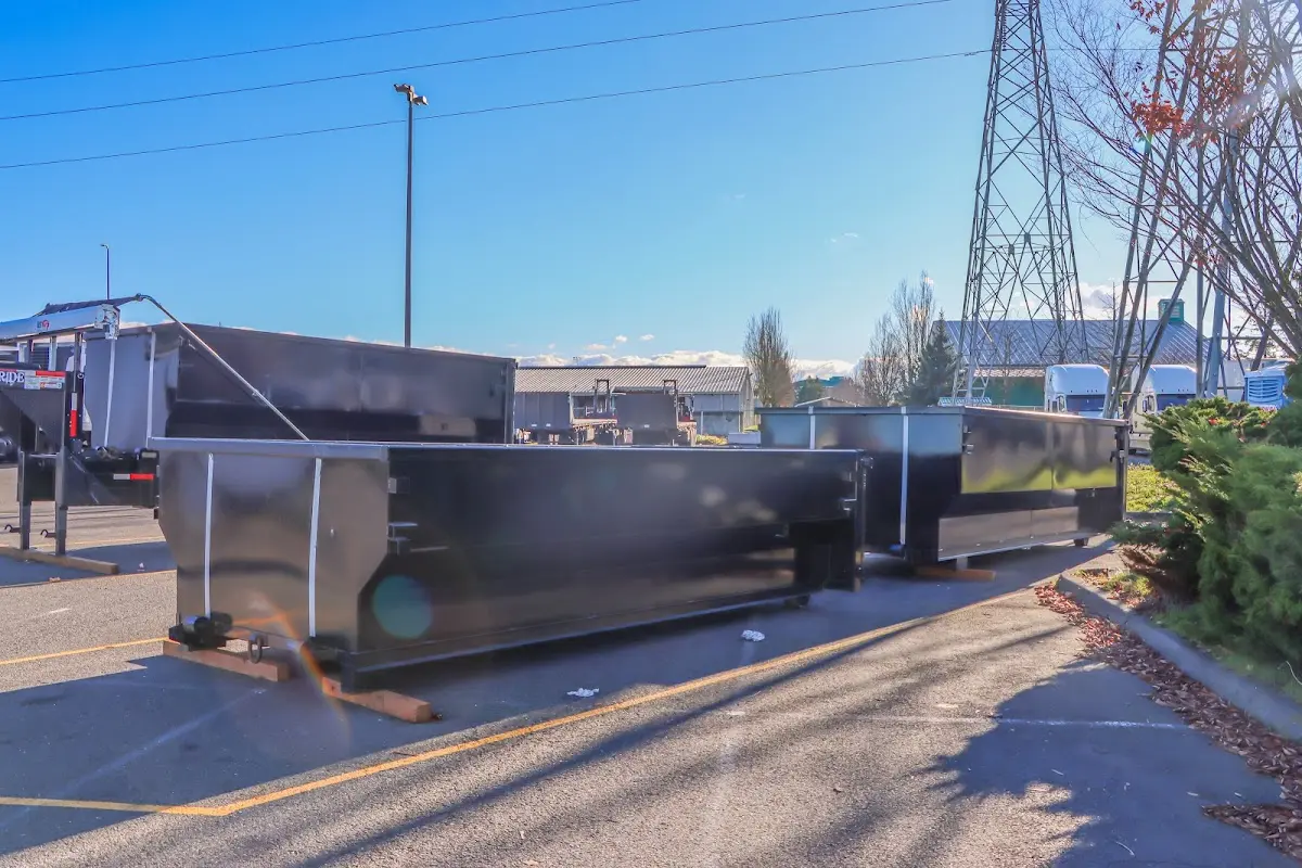 Roll-off dumpster ready for waste disposal at job site for 2 Yard Dumpster Rental in Ashland City